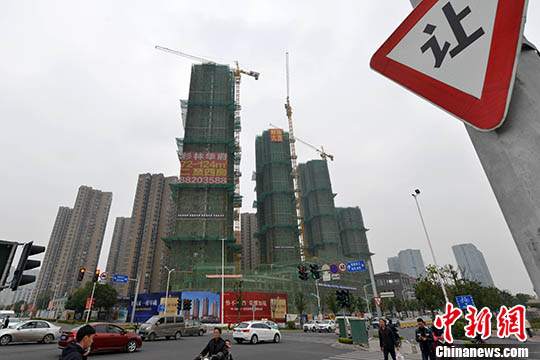 资料图：楼市。 <a target='_blank'  data-cke-saved-href='http://www.chinanews.com/' href='http://www.chinanews.com/'>中新社</a>记者 吕明 摄